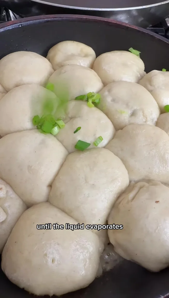 Remove from heat, sprinkle with green onions and sesame seeds.
