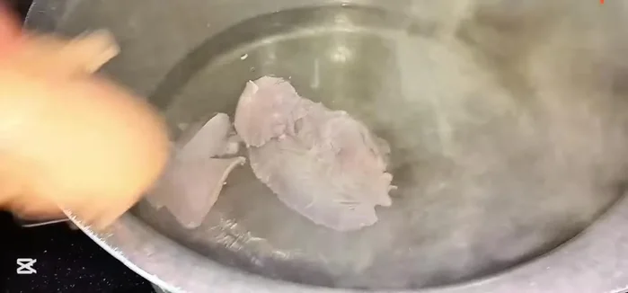 Boil chicken with water and salt for 15-20 minutes.