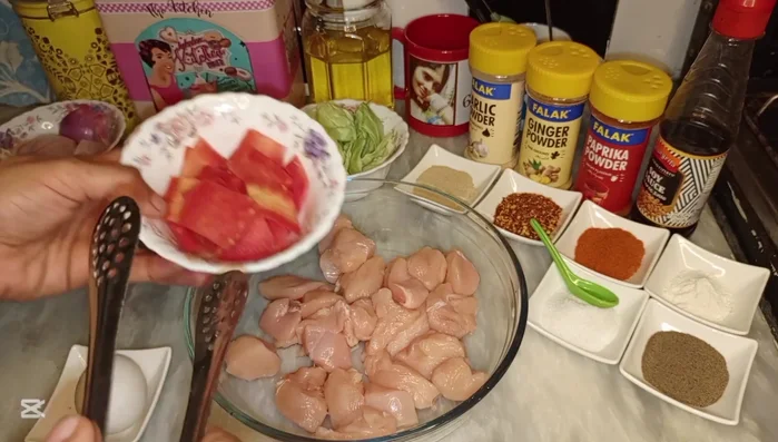 In a bowl, marinate the chicken and vegetables with garlic powder, ginger powder, paprika powder, soy sauce, white pepper powder, crushed red chili, red chili powder, chicken powder, black pepper powder, salt, one beaten egg, and oil. Mix well. Marinate overnight (or at least for several hours).