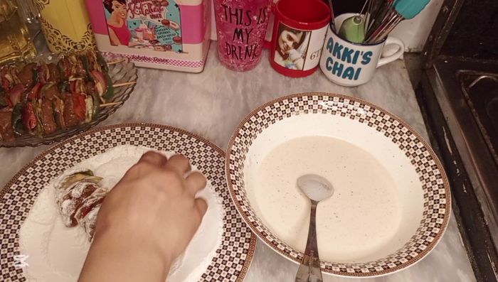 Coat each stick in flour, shaking off excess flour. Dip the floured sticks into the slurry, ensuring they are evenly coated with a thin layer. Gently shake off excess slurry.