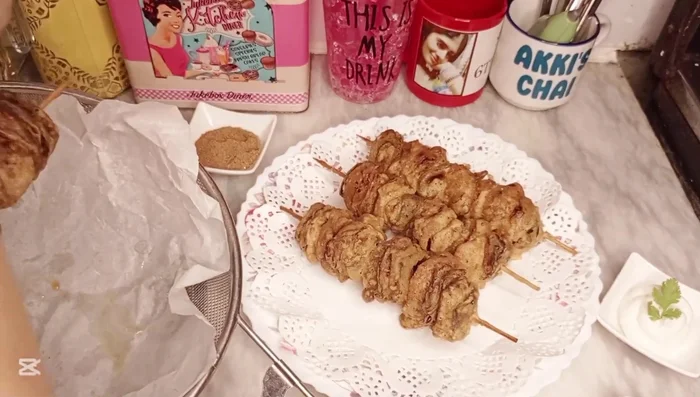 Remove from the oil and drain on paper towels. Sprinkle generously with chaat masala before serving.