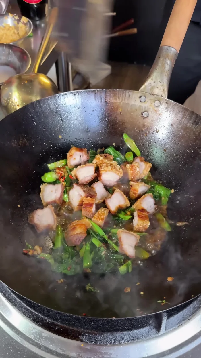 Add the chopped pork belly to the sauce and mix well.