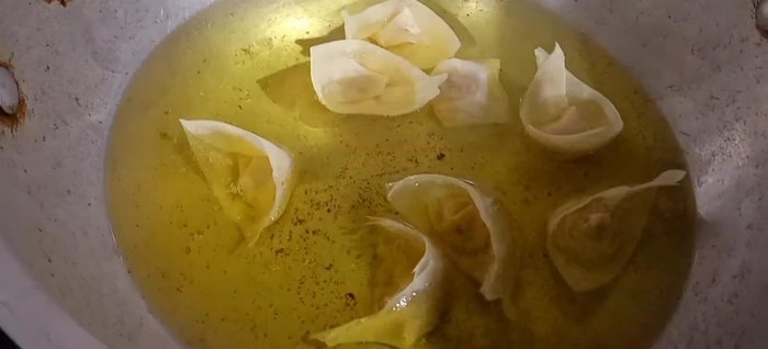 Fry the wontons: Fry in lukewarm oil to prevent burning. Stir gently with a whisk to ensure even cooking.