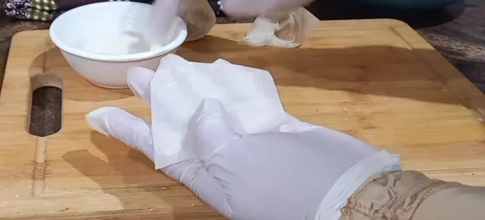 Assemble the wontons: Place a small amount (about half a teaspoon) of filling onto the center of each wonton wrapper. Too much filling will cause them to break.