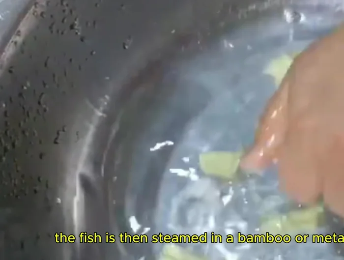 Steam the fish until the flesh is tender and has absorbed the flavors.
