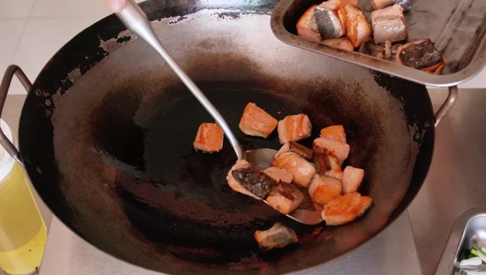 Remove salmon and set aside. Add more oil if needed.