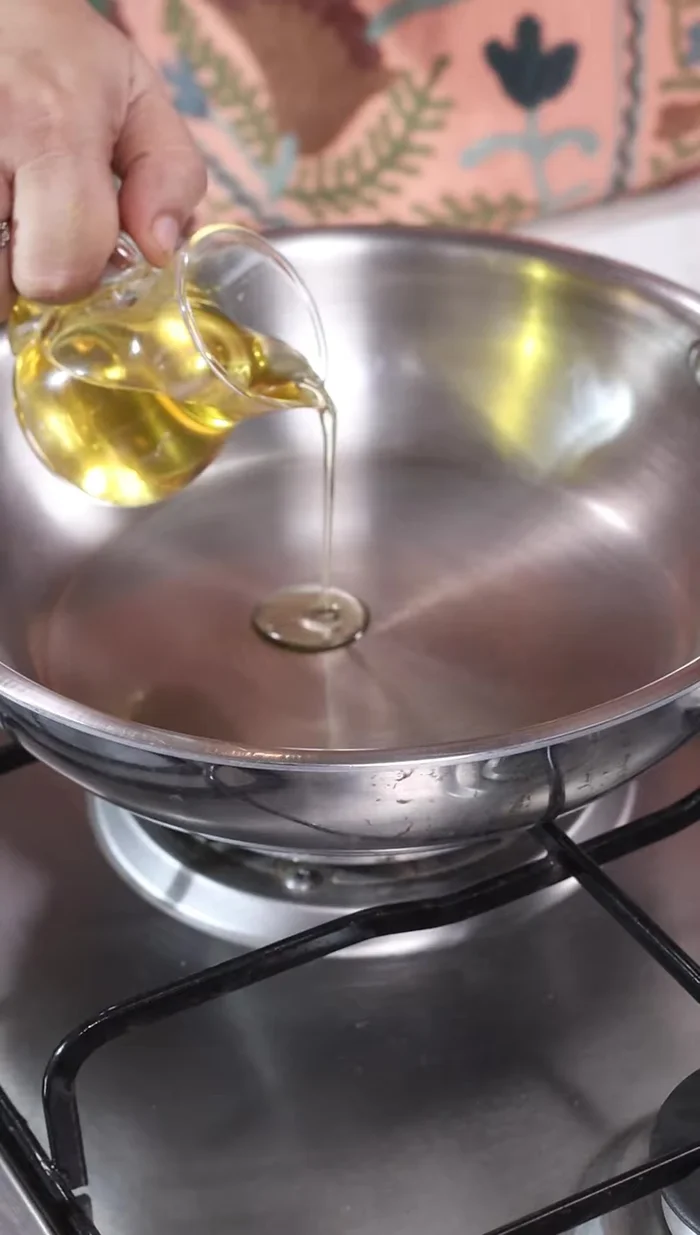 Heat a pan and add olive oil.