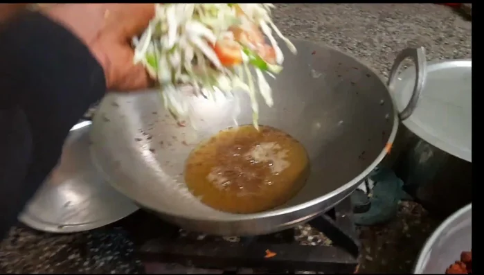 Fry the chopped vegetables until well-cooked.