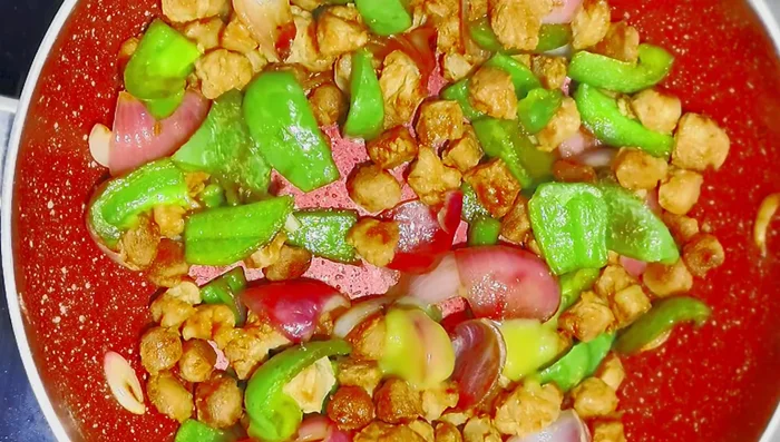 Add chilli sauce, ginger-garlic paste, Schezwan chutney, and soya chunks masala.