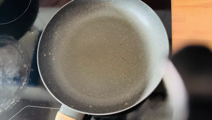 Heat oil in a pan and fry the egg rolls on low flame for 1-2 minutes per side, until lightly browned and crispy.