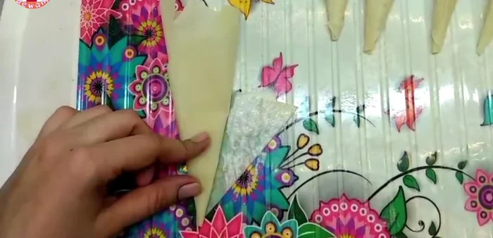 Apply batter to the cones to stick them together.