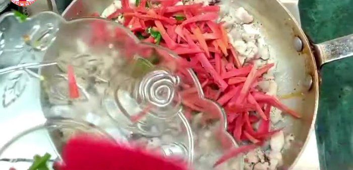 Add 2-3 finely chopped green chillies, 1 finely chopped carrot, and 1 finely chopped capsicum. Fry and cook until vegetables are soft.
