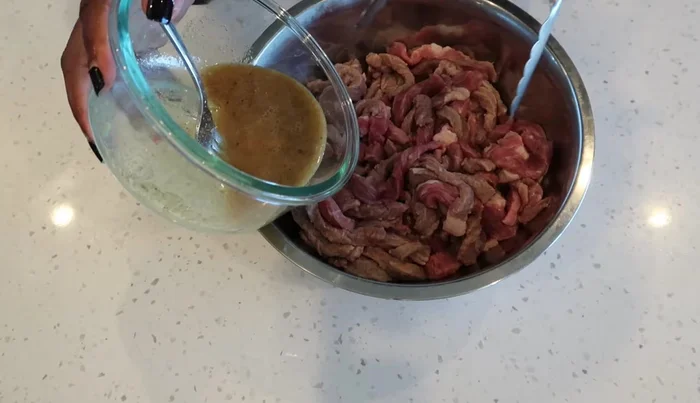 Marinate the beef in the prepared mixture for at least one hour in the fridge.