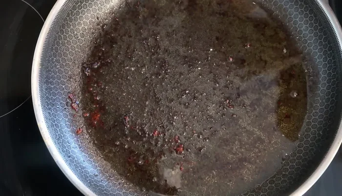 Stir-fry shredded carrots until softened.
