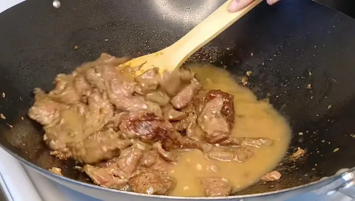 Add the sauce to the beef and stir until thickened. Add more cornstarch if needed.