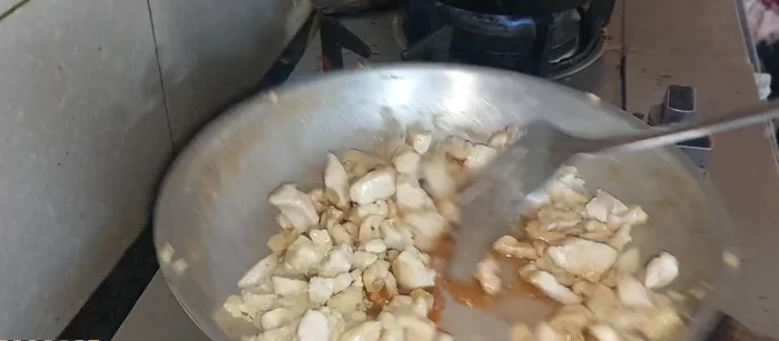 Add vinegar, soy sauce, hot sauce, ketchup, salt, chili flakes, and black pepper. Mix well. Cook on high flame for few minutes.