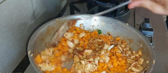 Add carrots and cook for 1 minute. Then, add capsicum and cook until slightly softened. Add pasta shells, green onions, and mix everything together.