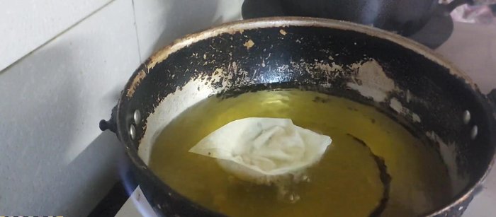Deep fry wontons in oil until golden brown and crispy. Ensure oil is hot but not too high, and do not overcrowd the pan.