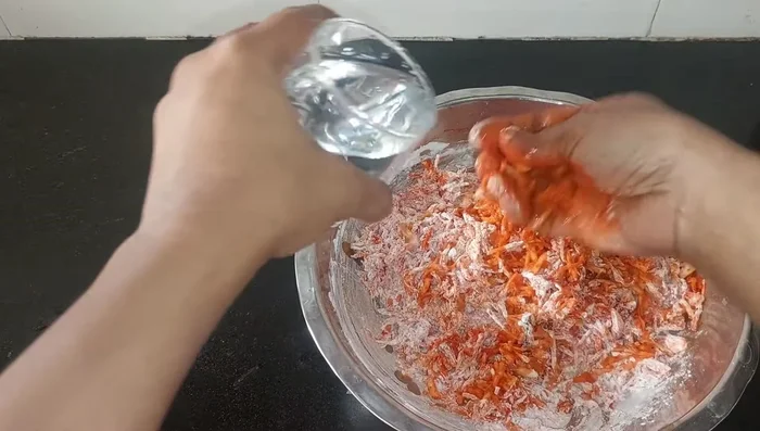 Add water and mix to form a batter.