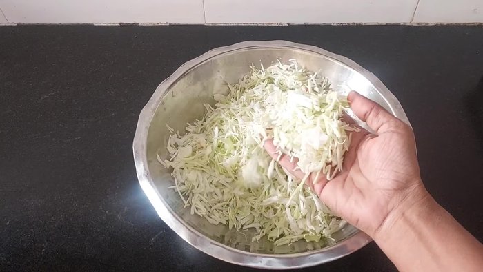 Add 1/2 teaspoon of ginger-garlic paste.