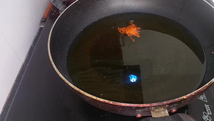 Heat oil in a frying pan. Add the bhajiya batter and fry until golden brown and crispy, stirring occasionally. This will take approximately 5-10 minutes.