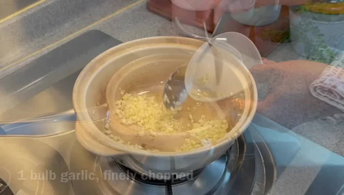 Method 1: In the same pot, add another tbsp of garlic and fry until golden brown. Add water (250ml), oyster sauce, soy sauces, pepper, and sugar.