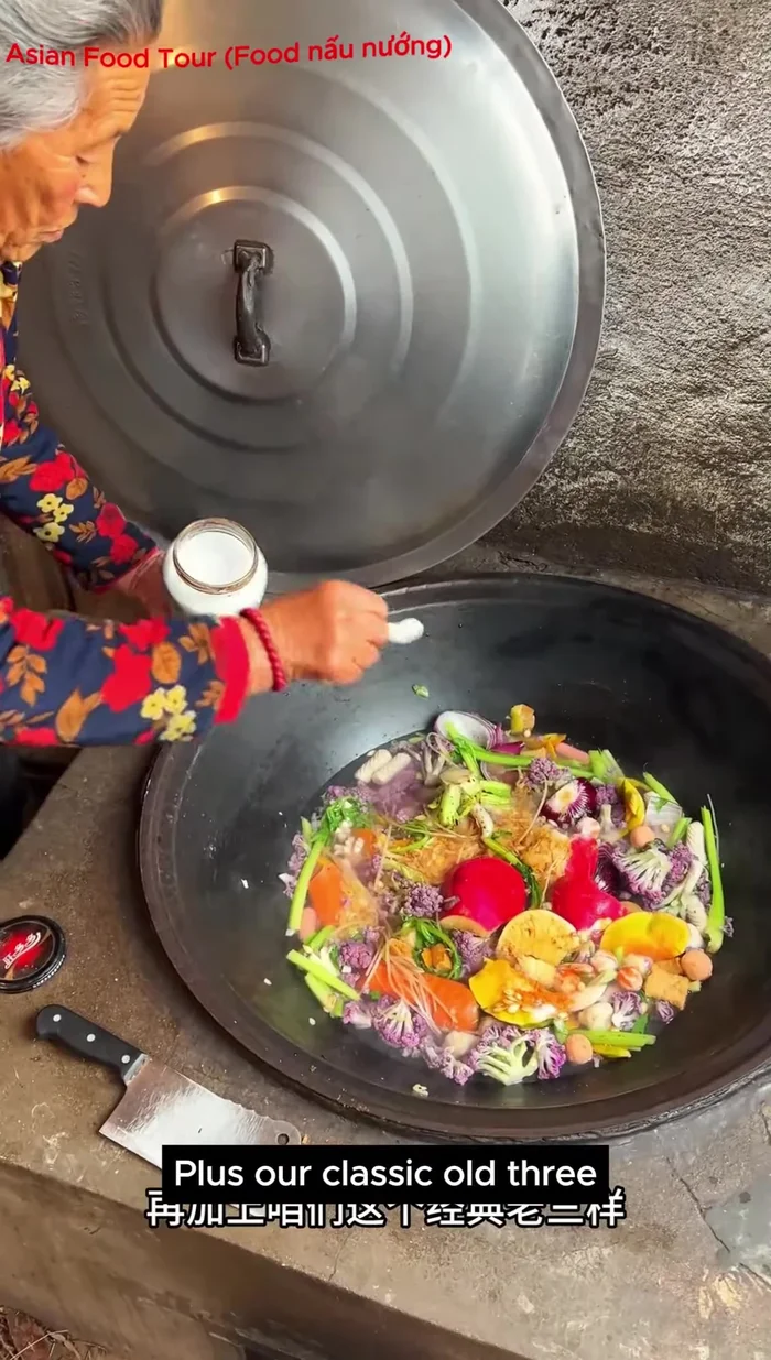 Simmer, controlling the heat using a lid.