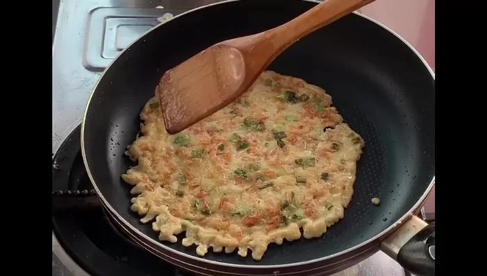 Cook the edges until browned.