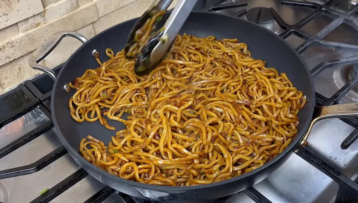 Add broth (if using thick noodles): Add chicken broth, cover, and cook for 2 minutes.