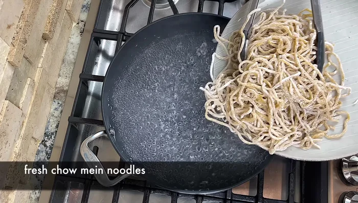 Cook noodles: Boil water, cook noodles for 2 minutes or until slightly firm, testing at 1-minute intervals. Remove from water.