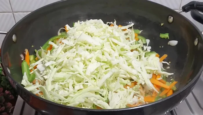 Add cabbage and mix well. Do not overcook; keep the vegetables crunchy.