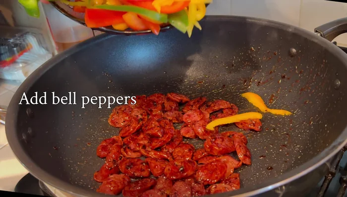 Add the bell peppers and cook until tender-crisp.