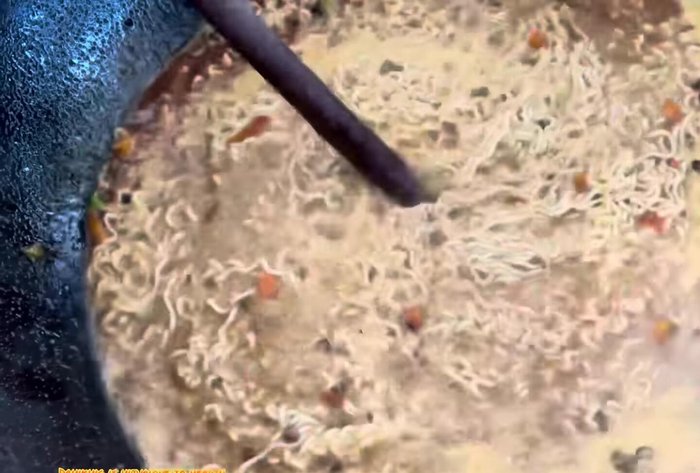 Boil water in a pot. Add noodles and cook according to package instructions.