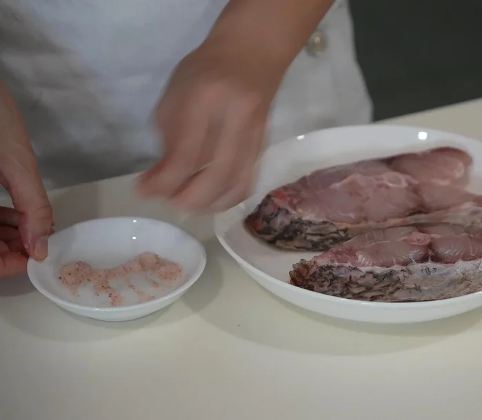 Heat oil in a non-stick pan. Pan-fry the fish until golden brown on both sides. Don't overcrowd the pan; fry in batches.