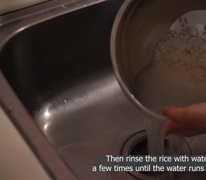 Rinse 1 cup of rice several times until the water runs clear.