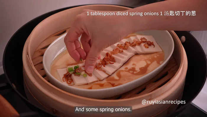 Garnish and serve: Garnish with shallots and spring onions.