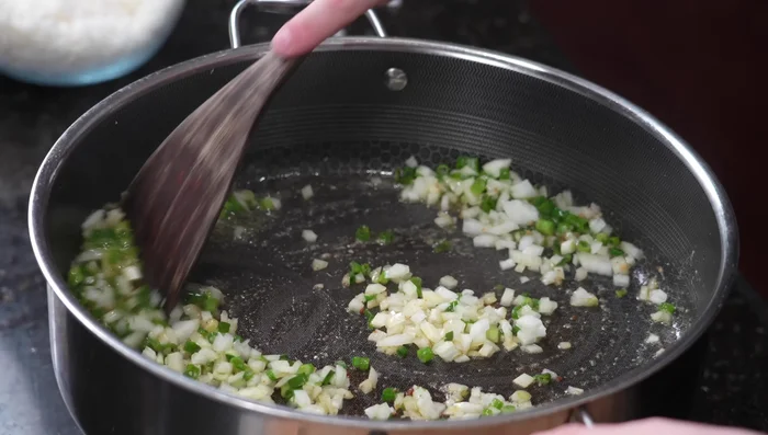 Sauté onions and garlic in the same pan.