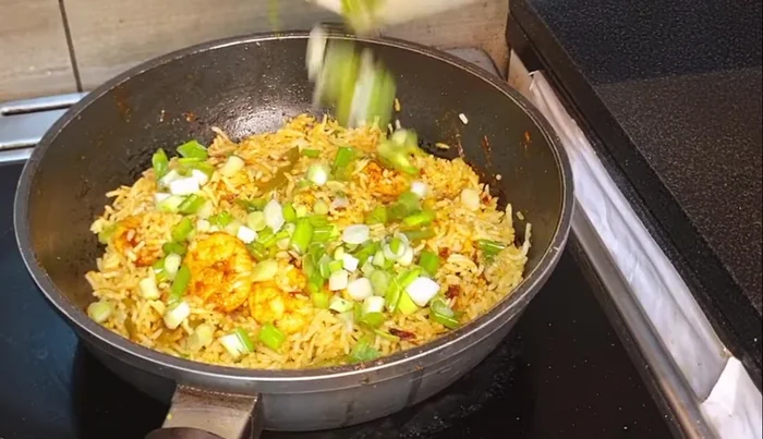 Add spring onion and mix well.