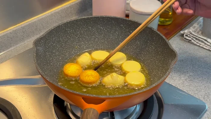Fry for about a minute per side, until nicely browned. If the oil starts to smoke, reduce the heat.