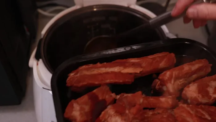 Glaze the ribs and bake in a preheated oven at 180°C (Gas Mark 4) for 10 minutes, or grill on a barbecue for a few minutes.