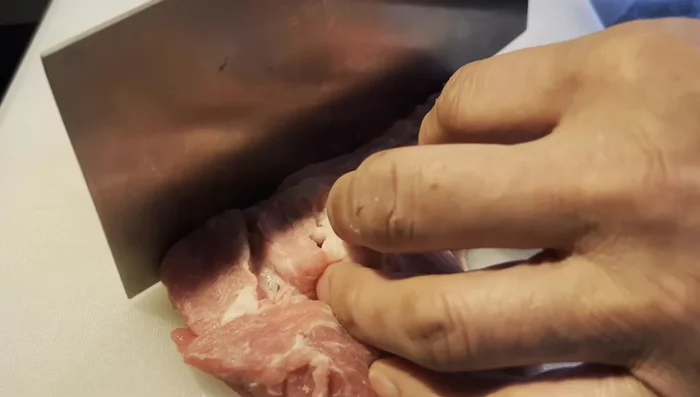 Cut pork chops into smaller pieces, leaving bones in if desired.