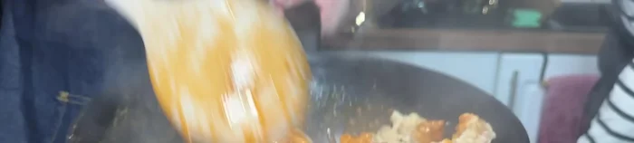 Toss the fried chicken in the sauce to coat evenly.