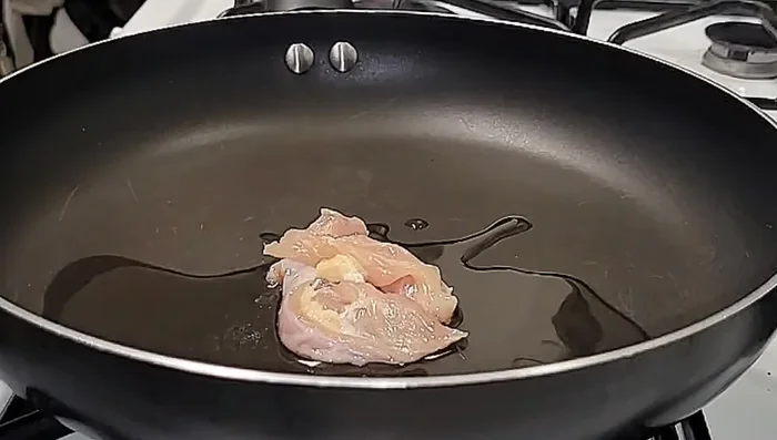 Add chicken pieces to the pot and cook for 5-6 minutes.