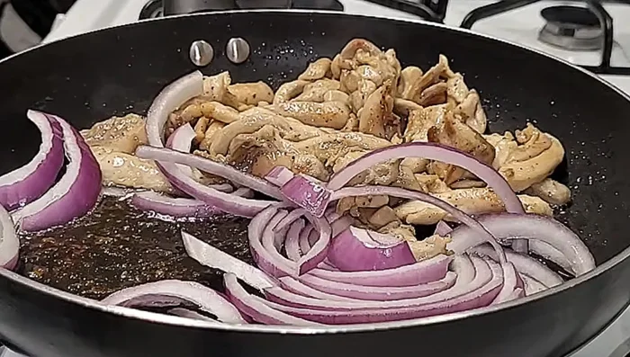 Add fresh onion and saute for about 30 seconds.
