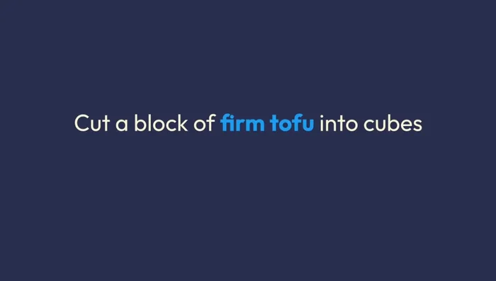Cut a block of firm tofu into cubes.