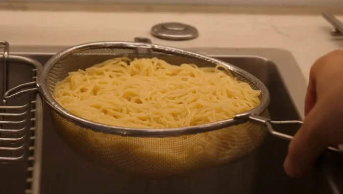 Remove the tofu with a slotted spoon and drain on paper towels.