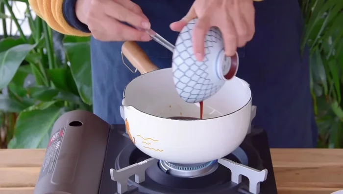 Thicken oyster sauce: Heat peanut oil in a saucepan. Add oyster sauce mixture and simmer. Drizzle in a cornstarch slurry (1/4 tsp cornstarch mixed with 1/4 tsp water) and cook until slightly thickened. (97.84)