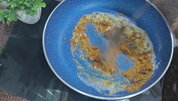 Add the Maggi masala from the packet, adding a little water to prevent burning.
