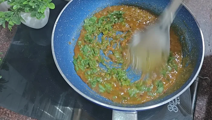 Add chopped coriander leaves.