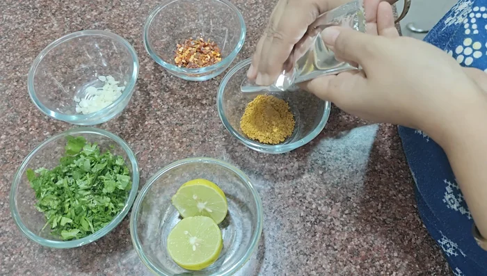 Strain and rinse the Maggi under cold water to stop the cooking process.